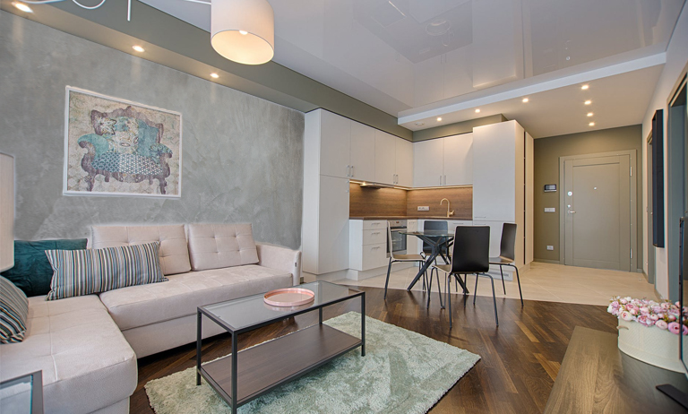 sala de estar com parede de cimento queimado
