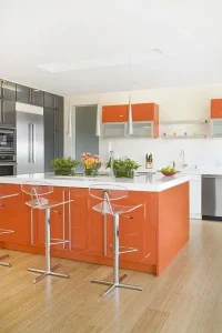 13-a-burnt-orange-kitchen-island-and-some-cabinets-spruce-up-a-neutral-grey-and-white-space
