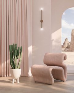 poltrona rosa com cacto verde
