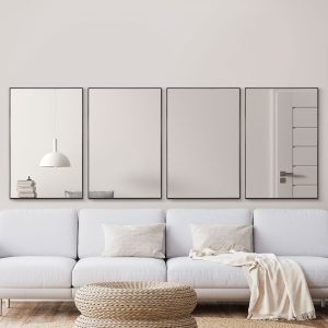 parede de sala de estar com quatro espelhos