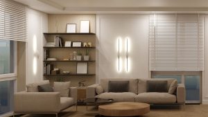 sala de estar com parede principal com iluminação estratégica